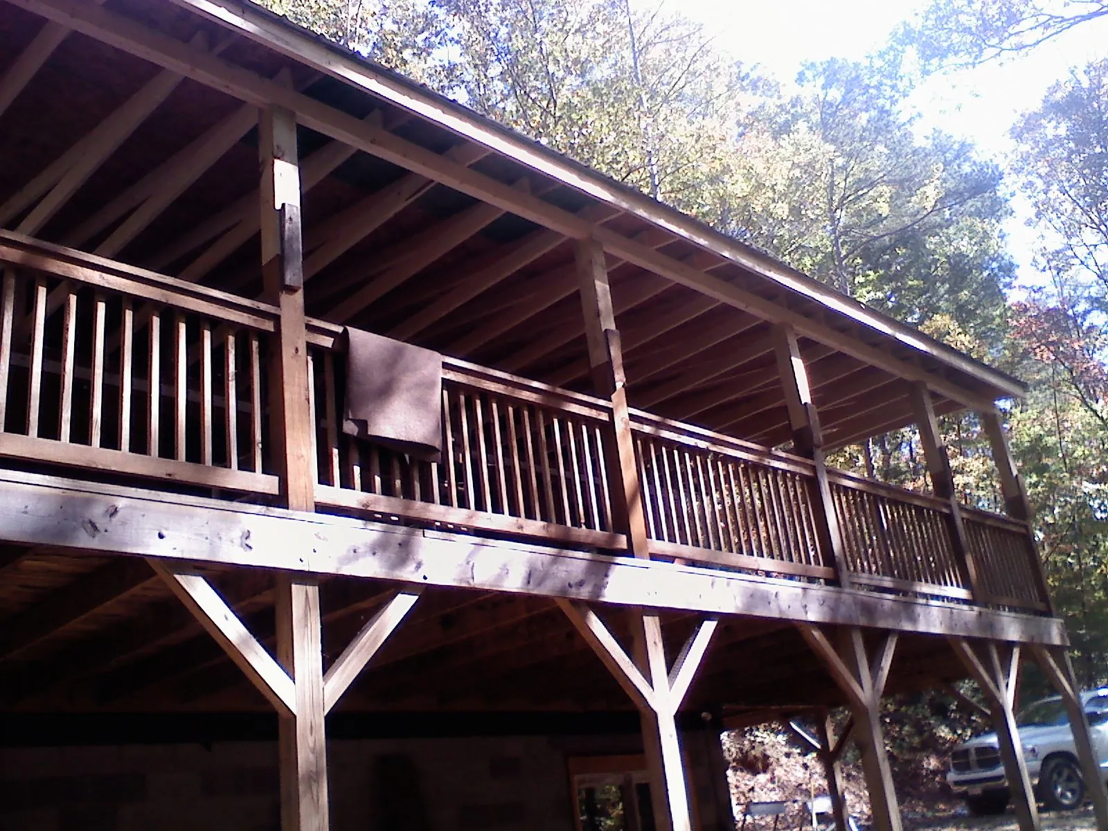 Timber framing under a new elevated porch and deck — Roof Leak Repair in Two Dot by Roofing Brothers